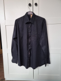 Elegant black men's shirt with a subtle pattern