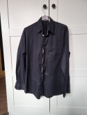 Elegant black men's shirt with a subtle pattern