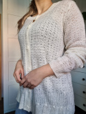 Thin cream sweater with a button stripe