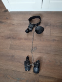 Collar and handcuffs connected with chains