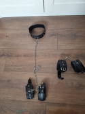 Collar and handcuffs connected with chains