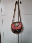 Handmade handbag made of leather and fur in Indian style