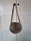 Handmade handbag made of leather and fur in Indian style