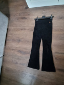 Black flared velvet-like pants for a 140 cm girl