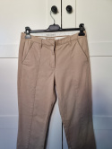 Beige cotton trousers with buttons on the calves