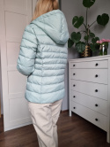 Pistachio quilted jacket with a hood for spring