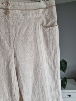 Letnie spodnie plus size r. 50 w tłoczone wzory beżowe kremowe bawełna